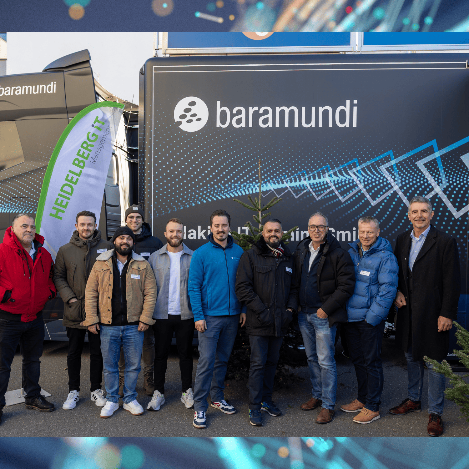 Gruppe von Personen vor einem Truck